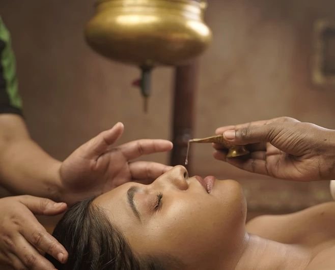 Nasya Ayurvedic nasal therapy treatment session at Pranavam Ayurveda Hospital in Kozhikode, Kerala